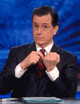 Stephen Colbert rolling up middle finger
